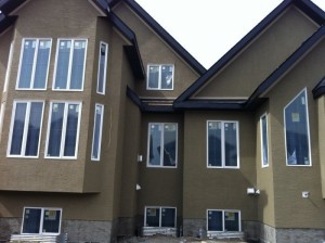 front of stucco house